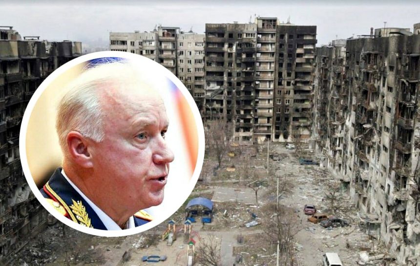 Олександр Бастрикін на тлі зруйнованого Маріуполя.